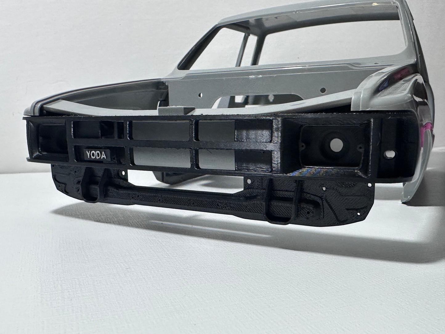 RockSlugCustoms ‘85 Hilux/XtraCab Grill w/ Light Bucket Inserts (physical product)