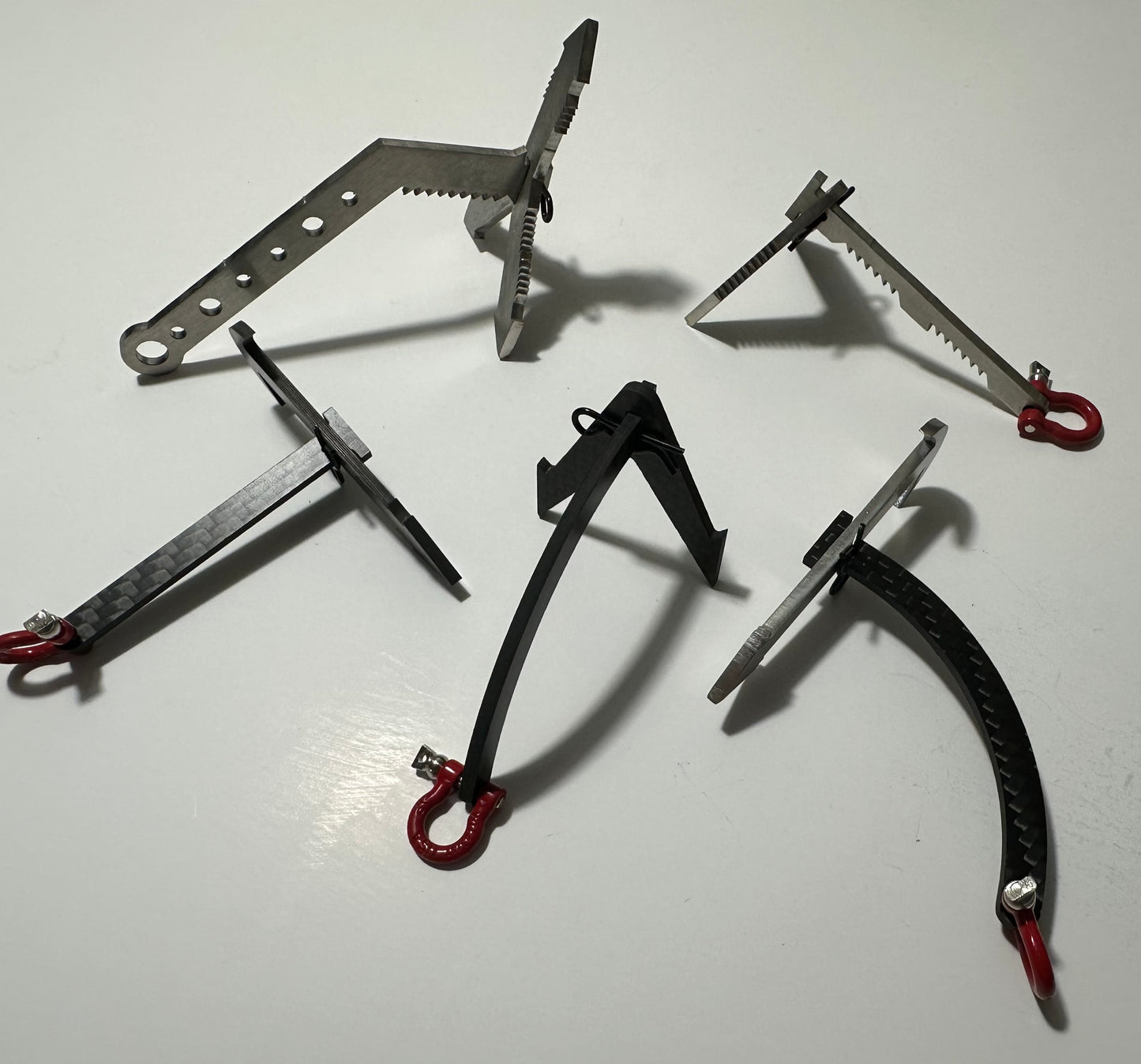 The “Clench” Interchangeable Land Anchor System